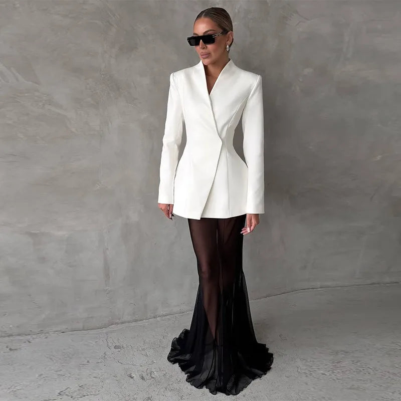 Conjunto elegante de blazer y falda larga